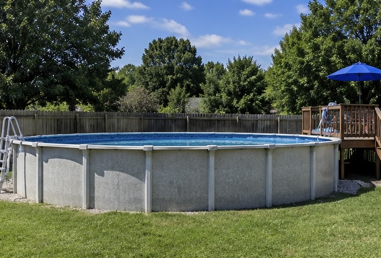 Above-ground pool standing in a fenced backyard before removal